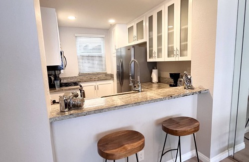 Huntington Beach Condo | Beachfront 2BR Townhome on PCH - sea view, gated parking, pool, spa, & wifi