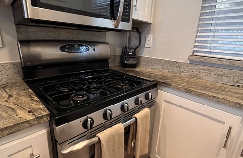Huntington Beach Condo | Beachfront 2BR Townhome on PCH - sea view, gated parking, pool, spa, & wifi