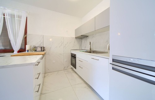 Njivice Apartment | Beachfront Oasis Krk Island, Njivice Gem 150sqm apt with private beach access