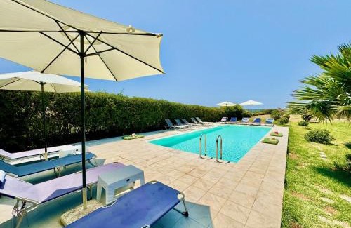 Almiros Beach Villa | Beachfront Villa JustRelax with private pool by DadoVillas