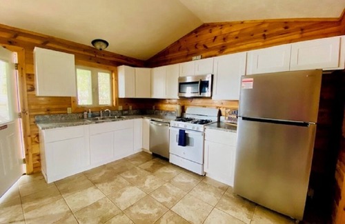 Mayfield Cabin | Beautiful 3-bedroom Waterfront Cabin Traverse City AC, dog ok, pontoon rentals