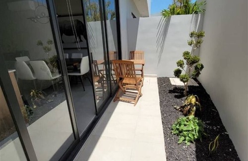 Puerto Juarez House | Beautiful 3-bedroom house in Playa Del Carmen with WiFi, AC, pool & fitness room