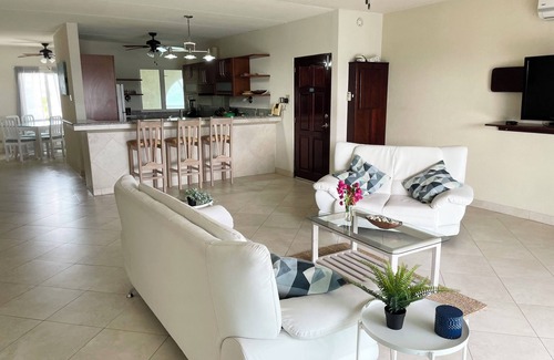 Atlantic Shores Villa | Beautiful, airy 3 bedroom second-floor unit with views of the ocean and pool.