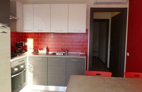 Torrazza Apartment | Beautiful apartment for 4 people with WIFI, pool, A/C, TV, balcony and parking