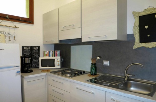 Brezzo di Bedero Apartment | Beautiful apartment for 4 guests with pool, WIFI, TV, patio and pets allowed