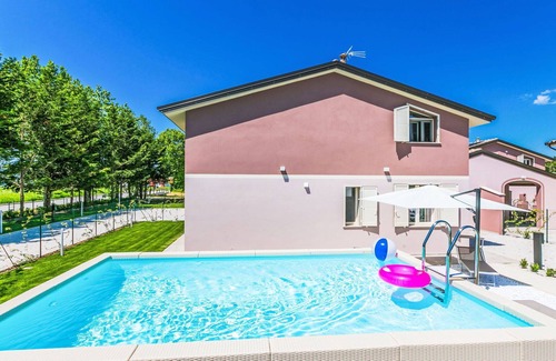 Cecina Apartment | Beautiful apartment for 7 guests with WIFI, A/C, private pool, TV, terrace, pets allowed and par.