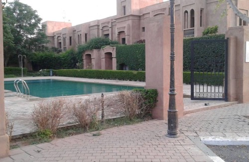Targa Apartment | Beautiful apartment with 3 facades and greenery, well-appointed secure with a swimming pool