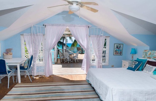 Worthing Villa | BEAUTIFUL BEACHFRONT LOCATION! On The Beach Villa, sleeps 8. Villa Benjamin.