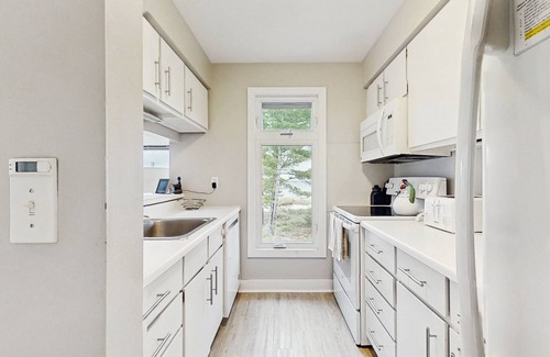 Glen Arbor House | Beautiful beachfront townhouse with deck, water views, community firepit