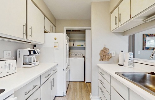 Glen Arbor House | Beautiful beachfront townhouse with deck, water views, community firepit