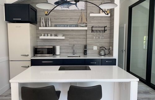 Anna Maria House | Beautiful brand new guest house, steps to Pine, 5 minutes to beach, heated pool