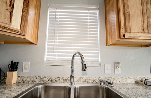 Brazoria House | Beautiful Cabin w/ extra-large walk-in shower & stone fireplace
