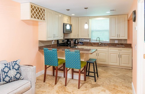 Indian Shores Condo | Beautiful condo across the street from the beach. Pet/kids friendly