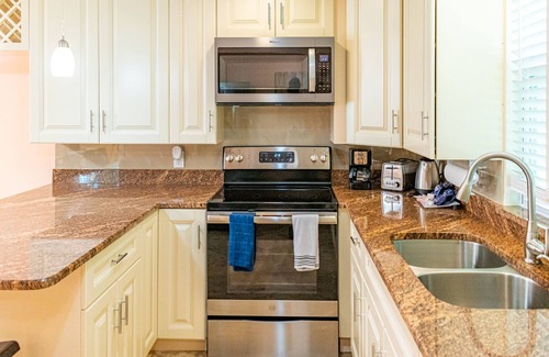 Indian Shores Condo | Beautiful condo across the street from the beach. Pet/kids friendly