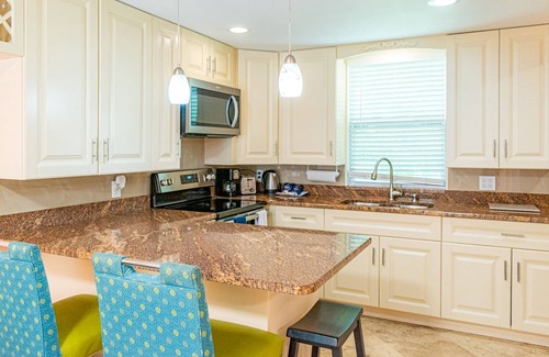 Indian Shores Condo | Beautiful condo across the street from the beach. Pet/kids friendly