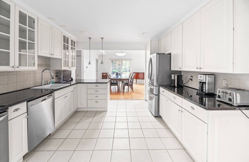 East Quogue House | Beautiful dog-friendly property with pool, grill, fireplace, AC, and open layout