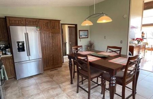 Altoona House | Beautiful Home in Town Acreage