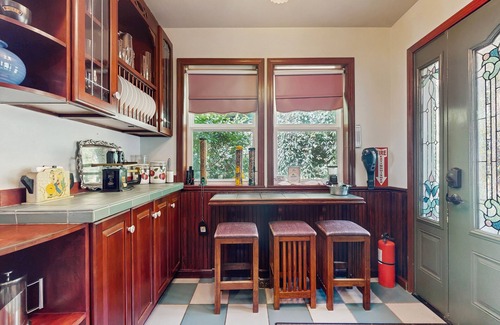 Indianola House | Beautiful home with foosball table, waterfront views, fireplace, basketball cour