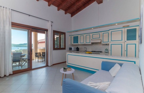 Porto Pozzo Apartment | Beautiful apartment for 4 guests with A/C, WIFI, TV, terrace and parking