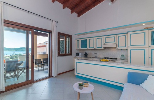 Porto Pozzo Apartment | Beautiful apartment for 4 guests with A/C, WIFI, TV, terrace and parking