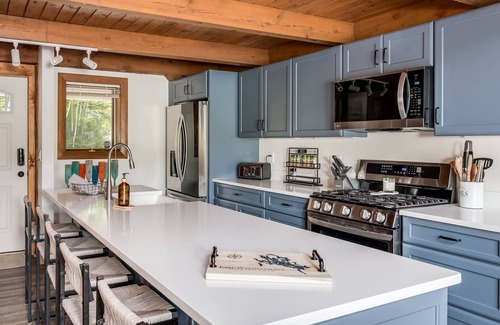 Moultonborough House | Beautiful new home sleeps 9 with perched sandy beach and steps into the water