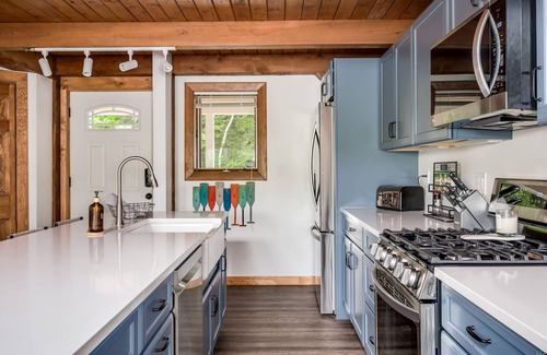 Moultonborough House | Beautiful new home sleeps 9 with perched sandy beach and steps into the water