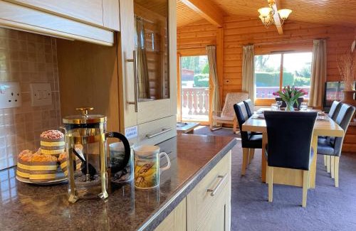 Rockcliffe House | Beautiful Norwegian Lodge in Kippford with Garden Pass the Keys