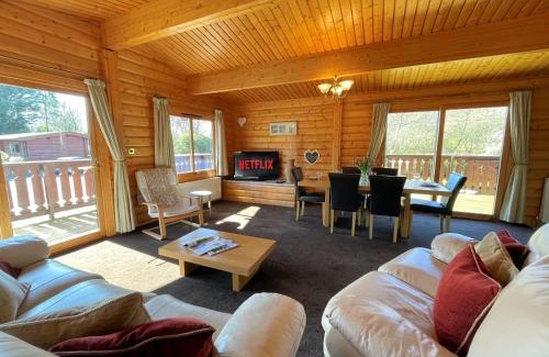 Rockcliffe House | Beautiful Norwegian Lodge in Kippford with Garden Pass the Keys