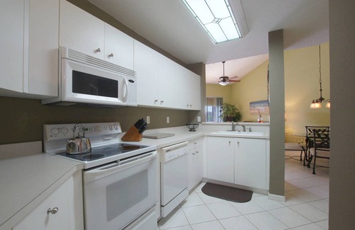 Naples Condo | BEAUTIFUL RESORT STYLE CONDO WITH AMAZING LAKE VIEWS! POOL ACROSS THE STREET!