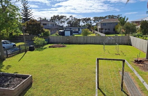 Ruakaka House | Beautiful Ruakaka beach fun, lots of space, 2 lounges, big garden