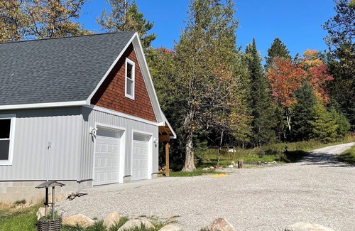 Grayling House | Beautiful spacious cabin with 20+ Acres on the Au Sable River!
