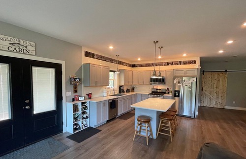 Grayling House | Beautiful spacious cabin with 20+ Acres on the Au Sable River!