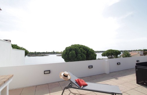 Le Grau-Du-Roi Condo | BEAUTIFUL TRIPLEX OF 145 m² + Solarium of 82 m² with view on the lake