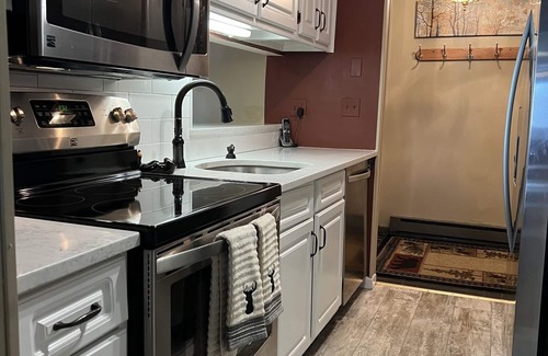 Lake George Condo | Beautiful waterfront 2-bedroom 2-bathroom condo with pool and beach access