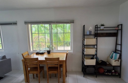 Long Bay Village House | Beautiful West End condo directly on Long Bay Beach