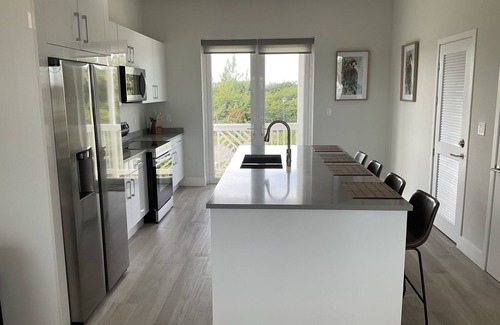 Palm Cay Condo | Beautiful white sand beaches, crystal clear turquoise water and romantic sunsets