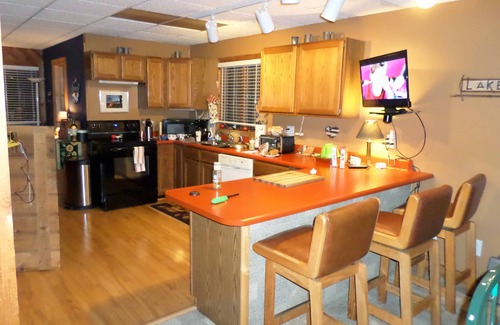 Lake City Ski Chalet | Beautifull beachfront Chalet with large deck facing the water. 50ft from water