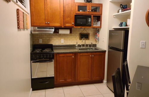 Potsdam Apartment | Beth's Place - On the River - W/Hot Tub, Pickleball Court & Putting Green