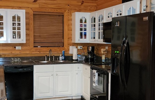 Iuka Cabin | BIG parking lot for boats w/hookup, near boat ramp! Private Cabin at Goat Island