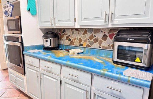 Crowley House | Big Private Fenced Yard, Hot Tub & Heatable Pool, No Stairs, Stone Floors