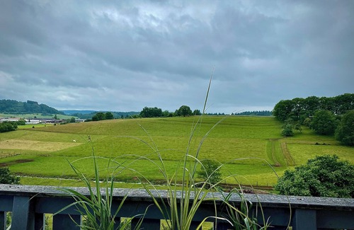 Losheim am See Apartment | BioLoft by the lake and distant views. Cozy vacation apartment on the top floor