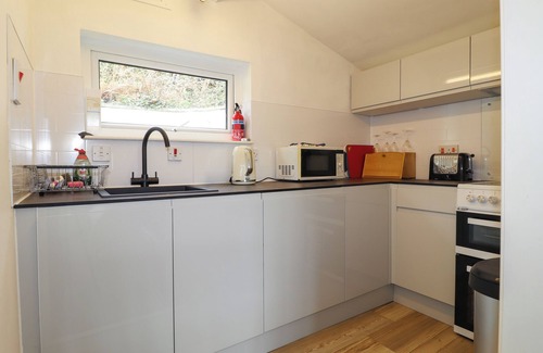 St Brides Cottage | BLACKROCK BOATHOUSE, country holiday cottage, with a garden in Dale