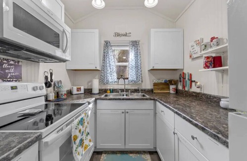 Emerald Isle House | Bloom Where You Are Planted Tiny House
