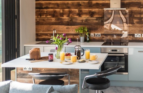 Croyde Apartment | Board Room @ Green Rooms, a contemporary and spacious one bedroom apartment