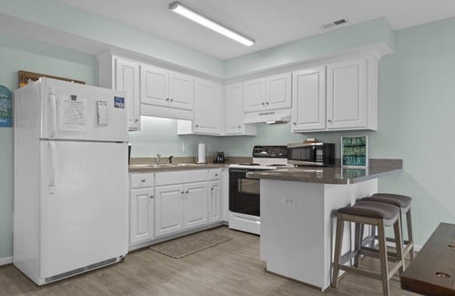 Atlantic Beach Condo | Boardwalk Shores B 2 Bedroom Duplex by RedAwning