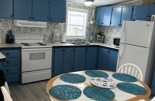 Parker House | Boat dock with slips, amazing views with water access on East St. Andrews Bay