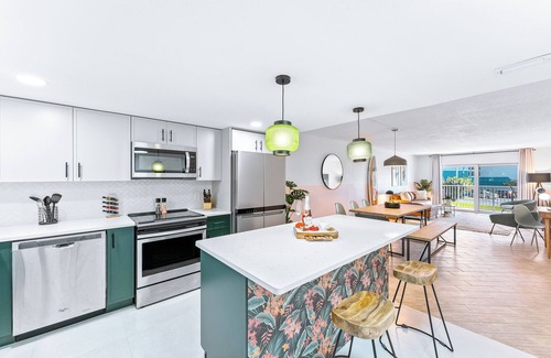 Avon By The Sea Condo | Boho-Chic Beachfront Escape: Pool, Private Balcony & Steps to the Pier