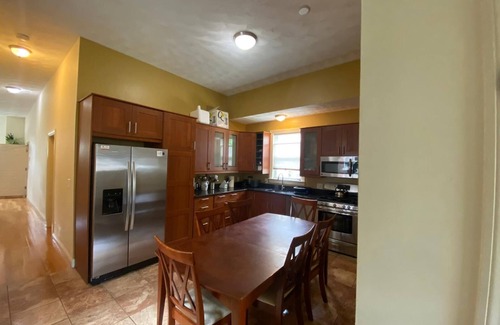 Egleston Square Apartment | Boston's Jamaica Plain 2 bdrm w/central air, parking, laundry, BBQ, & WiFi