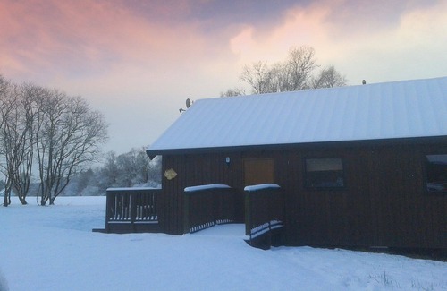 Dallavich Cabin | BRACKEN is a beautiful log cabin with lovely outlook over open meadow.