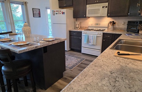 Evart House | Brand New Barndominium on 40 Acres with Private Lake